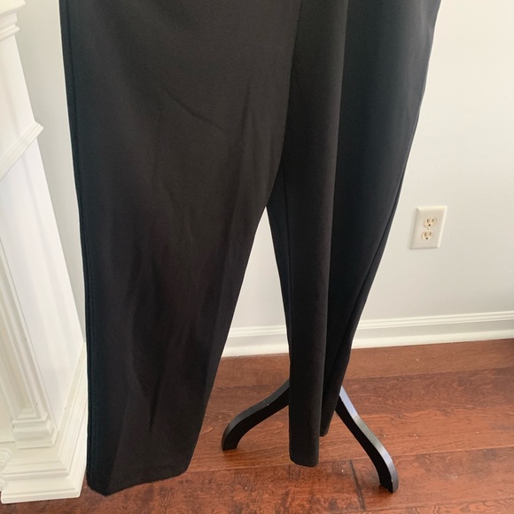Express Black stretch jumpsuit. Low v neck front & opening below breast line. - Picture 4 of 9
